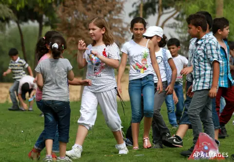 Palestinian children enjoy playing at the Al-Bashir amusement park on the outskirts of Gaza City on Oct. 18, 2012. Photo by Majdi Fathi