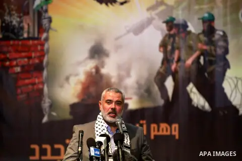 Palestinian Prime Minister in Gaza Ismail Haniyeh speaks during a ceremony to mark the first anniversary of a deal which saw the exchange of 1,027 Palestinian prisoners for captured Israeli soldier Gilad Shalit, in Gaza...
