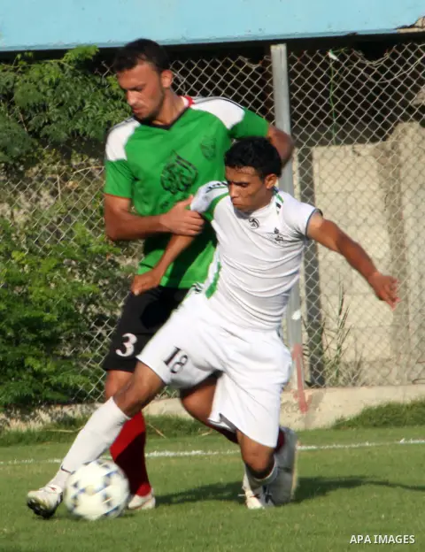 Palestinian soccer team of Shijaia and team of Rafah services, play during Match Clasico in Gaza city on Oct. 19, 2012. Photo by Alaa Shamaly