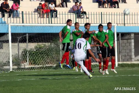 Palestinian soccer team of Shijaia and team of Rafah services, play during Match Clasico in Gaza city on Oct. 19, 2012. Photo by Alaa Shamaly