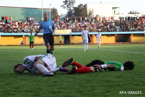 Palestinian soccer team of Shijaia and team of Rafah services, play during Match Clasico in Gaza city on Oct. 19, 2012. Photo by Alaa Shamaly