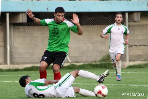 Palestinian soccer team of Shijaia and team of Rafah services, play during Match Clasico in Gaza city on Oct. 19, 2012. Photo by Alaa Shamaly