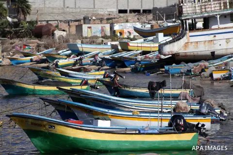 Palestinian fishermen prepare their nets in Gaza City's harbour on October 20, 2012. Israeli soldiers commandeered a vessel carrying pro-Palestinian activists destined for Gaza on Saturday, cutting off communications and...