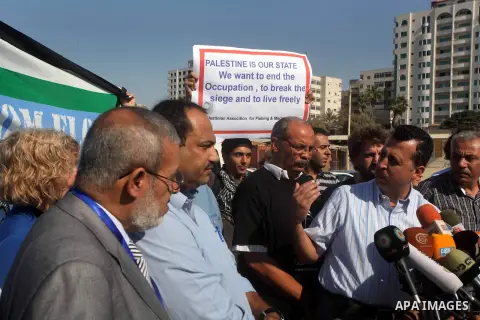 Jewish-American scholar and activist Noam Chomsky stands during a press conference to support the Gaza-bound flotilla in the port of Gaza City, Saturday, Oct. 20 , 2012. Israeli soldiers commandeered a vessel carrying pr...