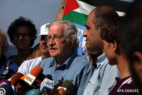 Jewish-American scholar and activist Noam Chomsky stands during a press conference to support the Gaza-bound flotilla in the port of Gaza City, Saturday, Oct. 20 , 2012. Israeli soldiers commandeered a vessel carrying pr...