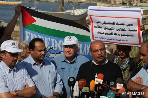 Jewish-American scholar and activist Noam Chomsky stands during a press conference to support the Gaza-bound flotilla in the port of Gaza City, Saturday, Oct. 20 , 2012. Israeli soldiers commandeered a vessel carrying pr...