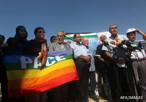 Jewish-American scholar and activist Noam Chomsky stands during a press conference to support the Gaza-bound flotilla in the port of Gaza City, Saturday, Oct. 20 , 2012. Israeli soldiers commandeered a vessel carrying pr...