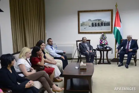 Palestinian President Mahmoud Abbas (Abu Mazen), meets with a delegation of Arab poets and writers in the West Bank city of Ramallah on Oct. 20, 2012. Photo by Thaer Ganaim