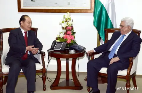 Palestinian President Mahmoud Abbas meets with the Chinese envoy to the peace process, in the West Bank town of Ramallah, 22 October 2012. Photo by Thaer Ganaim