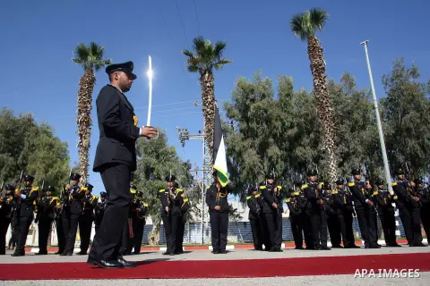 Palestinian honor guards greets Emir of Qatar Sheikh Hamad bin Khalifa al-Thani during a welcome ceremony in Rafah, southern Gaza Strip, Tuesday, Oct. 23, 2012. The Emir of Qatar entered the Gaza Strip on Tuesday for a v...