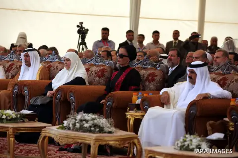 Palestinian Prime Minister in Gaza Strip, Ismail Haniyeh with the Emir of Qatar Sheik Hamad bin Khalifa al-Thani arrive to attend the opening ceremony for housing project in the southern Gaza Strip town of Khan Yunis, Oc...