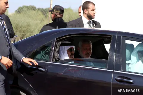 Palestinian Prime Minister in Gaza Strip, Ismail Haniyeh with the Emir of Qatar Sheik Hamad bin Khalifa al-Thani arrive to attend the opening ceremony for housing project in the southern Gaza Strip town of Khan Yunis, Oc...