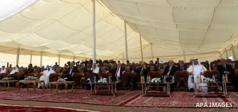Palestinian Prime Minister in Gaza Strip, Ismail Haniyeh with the Emir of Qatar Sheik Hamad bin Khalifa al-Thani arrive to attend the opening ceremony for housing project in the southern Gaza Strip town of Khan Yunis, Oc...