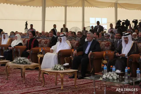 Palestinian Prime Minister in Gaza Strip, Ismail Haniyeh with the Emir of Qatar Sheik Hamad bin Khalifa al-Thani arrive to attend the opening ceremony for housing project in the southern Gaza Strip town of Khan Yunis, Oc...