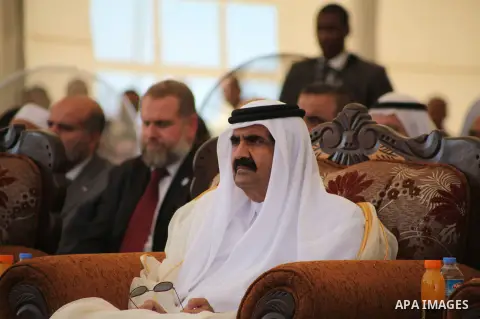 Emir of Qatar Sheik Hamad bin Khalifa al-Thani attends the opening ceremony for housing project in the southern Gaza Strip town of Khan Yunis, October 23, 2012. The Emir of Qatar entered the Gaza Strip on Tuesday for a v...
