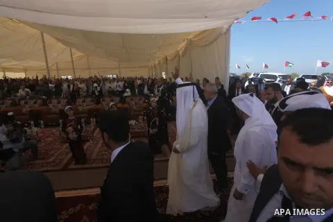 Palestinian Prime Minister in Gaza Strip, Ismail Haniyeh with the Emir of Qatar Sheik Hamad bin Khalifa al-Thani arrive to attend the opening ceremony for housing project in the southern Gaza Strip town of Khan Yunis, Oc...