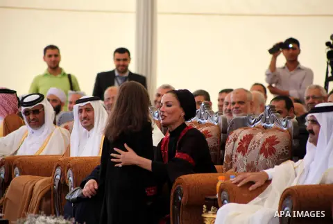 The Emir of Qatar Sheikh Hamad bin Khalifa al-Thani and his wife Sheikha Mozah bint Nasser al-Missned attend cornerstone laying ceremony for Hamad, a new residential neighbourhood in Khan Younis in the southern Gaza Stri...