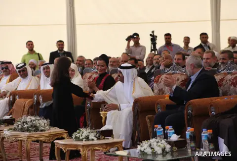 Palestinian Prime Minister in Gaza strip, Ismail Haniyeh and the Emir of Qatar Sheikh Hamad bin Khalifa al-Thani arrive at a cornerstone laying ceremony for Hamad, a new residential neighbourhood in Khan Younis in the so...