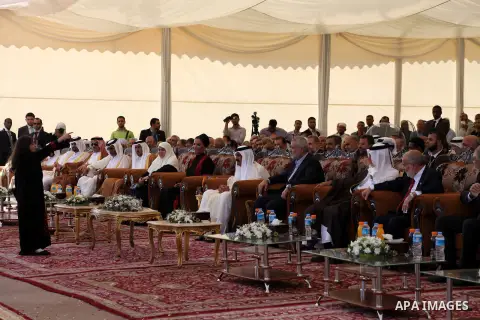 Palestinian Prime Minister in Gaza strip, Ismail Haniyeh and the Emir of Qatar Sheikh Hamad bin Khalifa al-Thani arrive at a cornerstone laying ceremony for Hamad, a new residential neighbourhood in Khan Younis in the so...