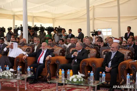 Egyptian Education Miinister (C) attends a cornerstone laying ceremony for Hamad, a new residential neighbourhood in Khan Younis in the southern Gaza Strip, 23 October 2012. The Emir of Qatar entered the Gaza Strip on Tu...
