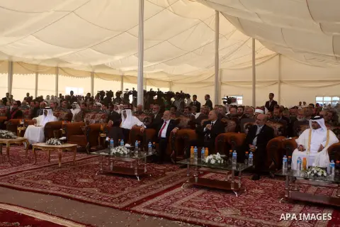 Palestinian Prime Minister in Gaza strip, Ismail Haniyeh and the Emir of Qatar Sheikh Hamad bin Khalifa al-Thani arrive at a cornerstone laying ceremony for Hamad, a new residential neighbourhood in Khan Younis in the so...