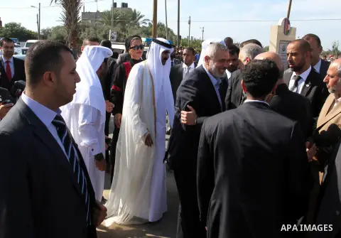 Palestinian Prime Minister in Gaza strip, Ismail Haniyeh and the Emir of Qatar Sheikh Hamad bin Khalifa al-Thani attend a cornerstone laying ceremony for rehabilitation Salah al-Din street in the central Gaza Strip Octob...