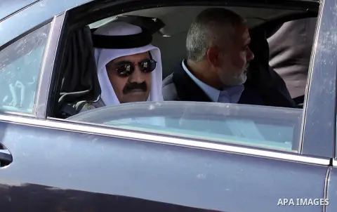 Palestinian Prime Minister in Gaza strip, Ismail Haniyeh and the Emir of Qatar Sheikh Hamad bin Khalifa al-Thani attend a cornerstone laying ceremony for rehabilitation Salah al-Din street in the central Gaza Strip Octob...