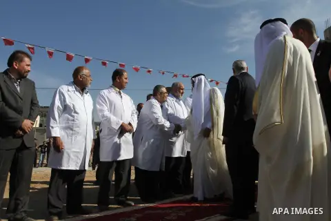 Palestinian Prime Minister in Gaza strip, Ismail Haniyeh and the Emir of Qatar Sheikh Hamad bin Khalifa al-Thani attend a cornerstone laying ceremony for a hospital in Gaza city October 23, 2012. The Emir of Qatar entere...