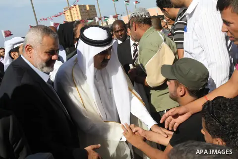 Palestinian Prime Minister in Gaza strip, Ismail Haniyeh and the Emir of Qatar Sheikh Hamad bin Khalifa al-Thani attend a cornerstone laying ceremony for a hospital in Gaza city October 23, 2012. The Emir of Qatar entere...