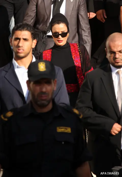 Qatar's First Lady Sheikha Mozah bint Nasser al-Missned leaves the Atfaluna Society for Deaf Children in the Gaza Strip on October 23, 2012. The Emir of Qatar entered the Gaza Strip on Tuesday for a visit that broke the...