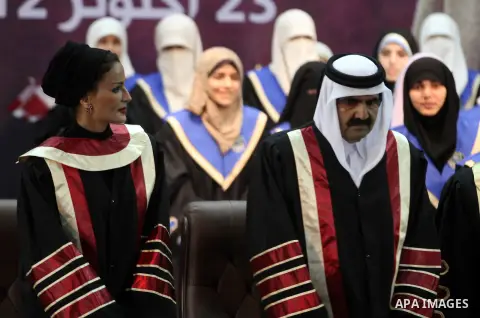 Qatari Emir Sheikh Hamad bin Khalifa al-Thani and his wife Qatar's First Lady Sheikha Mozah bint Nasser al-Missned attend a celebration at the Islamic University in Gaza city on October 23, 2012. The Emir of Qatar entere...