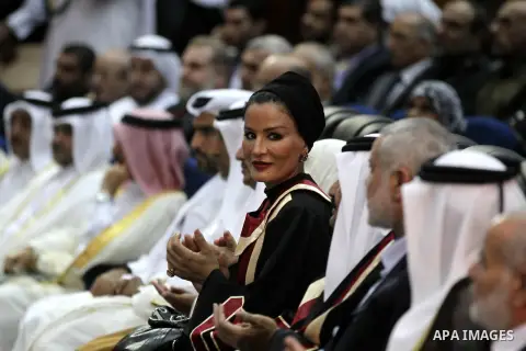 Qatari Emir Sheikh Hamad bin Khalifa al-Thani, Palestinian prime minister in Gaza strip, Ismail Haniyah and Qatar's First Lady Sheikha Mozah bint Nasser al-Missned attend a celebration at the Islamic University in Gaza c...