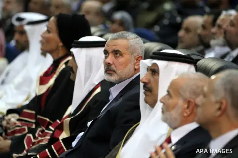 Qatari Emir Sheikh Hamad bin Khalifa al-Thani, Palestinian prime minister in Gaza strip, Ismail Haniyah and Qatar's First Lady Sheikha Mozah bint Nasser al-Missned attend a celebration at the Islamic University in Gaza c...
