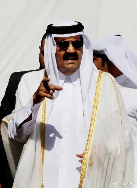 The Emir of Qatar Sheikh Hamad bin Khalifa al-Thani attends cornerstone laying ceremony for Hamad, a new residential neighbourhood in Khan Younis in the southern Gaza Strip October 23, 2012. The Emir of Qatar entered the...