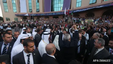 Qatari Emir Sheikh Hamad bin Khalifa al-Thani, Palestinian prime minister in Gaza strip, Ismail Haniyah and Qatar's First Lady Sheikha Mozah bint Nasser al-Missned attend a celebration at the Islamic University in Gaza c...