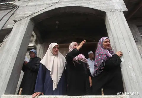 Palestinian relatives of Hamas gunman Loay Abu Jarad mourn during his funeral in Beit Lahiya in the northern Gaza Strip October 24, 2012. Israel killed a Hamas gunman in its second round of air strikes in as many days on...