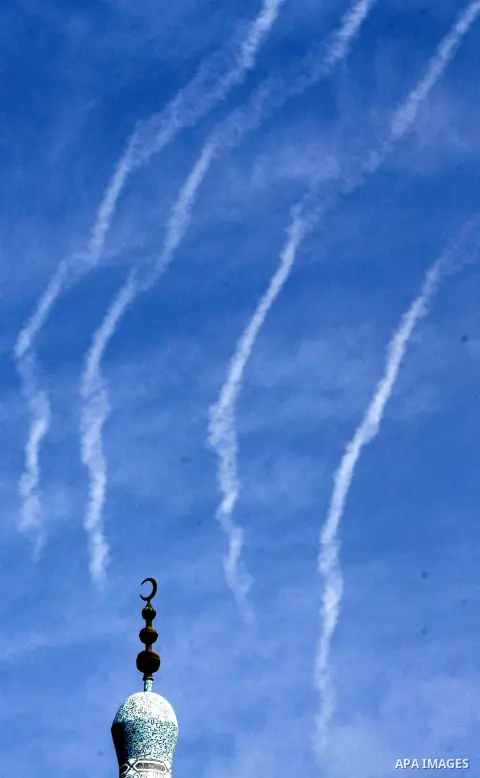 Palestinian militants from Hamas (not seen) fire home-made rockets at isreali southern towns in Rafah, southern Gaza Strip, on October 24, 2012. Palestinians fired more than 40 rockets from the Gaza Strip into Israel inj...