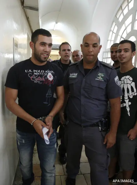 A Palestinian youth arrives to an Israeli court that was due to rule on his participation in al-Aqsa mosque demonstrations against an anti-Islam film made in the U.S. mocking Prophet Mohammad, in Jerusalem, Oct. 24, 2012...