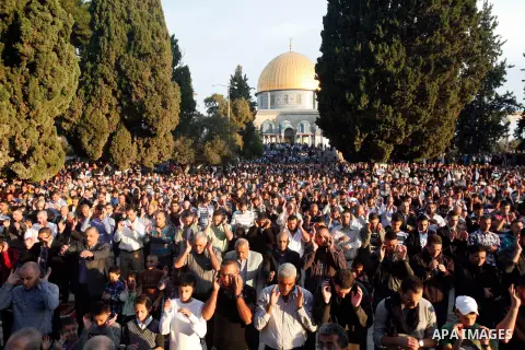 Palestinian Muslim worshippers pray at the al-Aqsa Mosque compound in Jerusalem's old city on the first day of Eid al-Adha on October 26, 2012 as Muslims worldwide commemorate Eid al-Adha, or the Feast of the Sacrifice,...