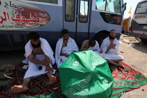 Muslim pilgrims rest on Mount Mercy on the plains of Arafat during the peak of the annual haj pilgrimage near the holy city of Mecca October 26, 2012. Nearly 3 million Muslim pilgrims started the first phase of the annua...