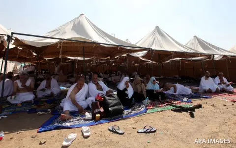 Muslim pilgrims rest on Mount Mercy on the plains of Arafat during the peak of the annual haj pilgrimage near the holy city of Mecca October 26, 2012. Nearly 3 million Muslim pilgrims started the first phase of the annua...