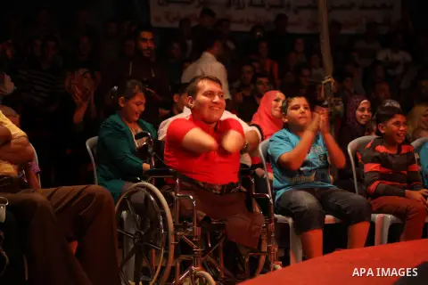 Palestinians watch members of the Egyptian National Circus, perform in Gaza City, Oct. 27, 2012. The Egyptian National Circus put on its first show of a month-long visit to the impoverished coastal territory, a sign of w...