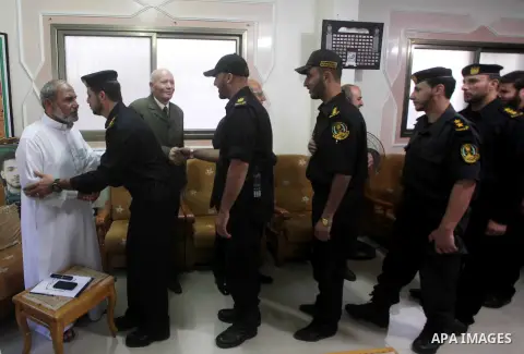 Palestinian Hamas leader Mahmoud al-Zahar recieves congratulations in Eid al-Adha at his house in Gaza city, on October 27, 2012. Muslims around the world celebrate Eid al-Adha to mark the end of the haj by slaughtering...