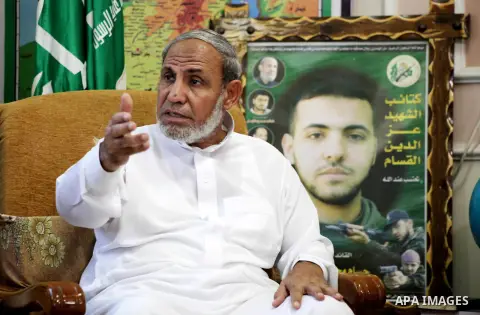 Palestinian Hamas leader Mahmoud al-Zahar recieves congratulations in Eid al-Adha at his house in Gaza city, on October 27, 2012. Muslims around the world celebrate Eid al-Adha to mark the end of the haj by slaughtering...