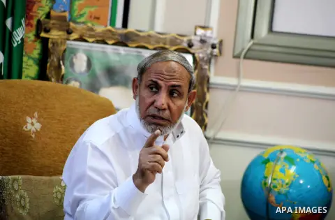 Palestinian Hamas leader Mahmoud al-Zahar recieves congratulations in Eid al-Adha at his house in Gaza city, on October 27, 2012. Muslims around the world celebrate Eid al-Adha to mark the end of the haj by slaughtering...