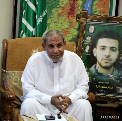 Palestinian Hamas leader Mahmoud al-Zahar recieves congratulations in Eid al-Adha at his house in Gaza city, on October 27, 2012. Muslims around the world celebrate Eid al-Adha to mark the end of the haj by slaughtering...