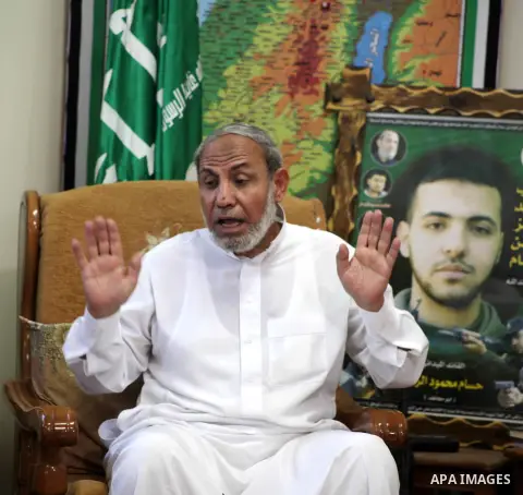 Palestinian Hamas leader Mahmoud al-Zahar recieves congratulations in Eid al-Adha at his house in Gaza city, on October 27, 2012. Muslims around the world celebrate Eid al-Adha to mark the end of the haj by slaughtering...