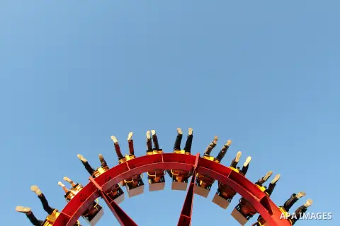 Palestinians enjoy themselves at an amusement park in Gaza City as the Muslim world celebrates the third day of the Eid al-Adha holiday on October 28, 2012. Eid al-Adha or "Feast of the Sacrifice" marks the end of the an...