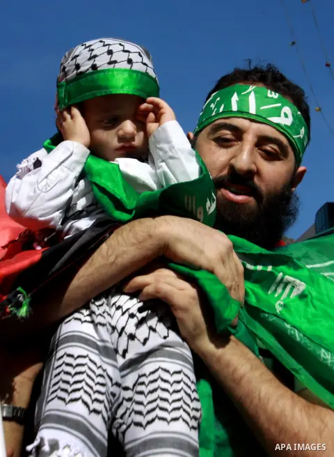 Palestinian Hamas member Hassan Safadi is greeted by his relatives as he arrive in the West Bank city of Nablus after his release from Israeli jail, Monday, Oct. 29, 2012. Hassan reportedly went on an on-and-off hunger s...