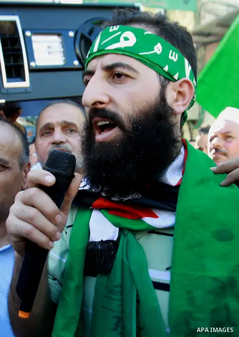 Palestinian Hamas member Hassan Safadi is greeted by his relatives as he arrive in the West Bank city of Nablus after his release from Israeli jail, Monday, Oct. 29, 2012. Hassan reportedly went on an on-and-off hunger s...